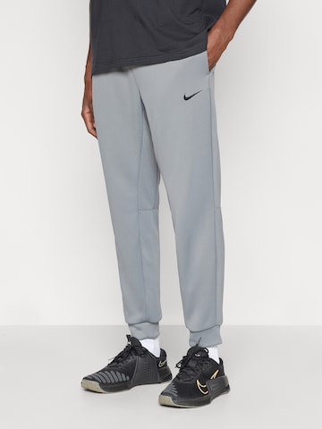NIKE Tapered Sportnadrágok 'FLEX' - szürke: elől