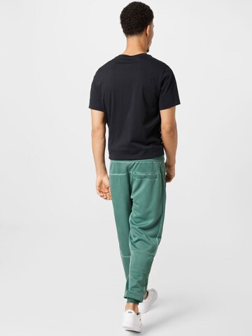 Nike Sportswear Zúžený strih Nohavice - Zelená