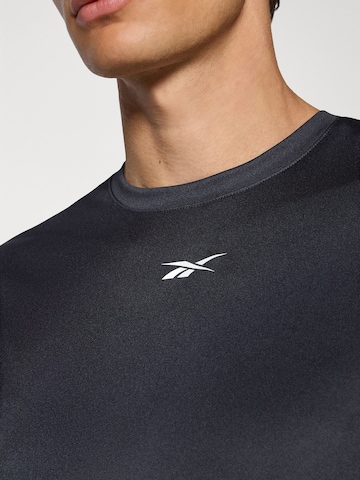 Reebok Funkčné tričko 'ID Train' - Čierna
