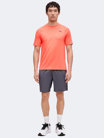 PUMA Performance shirt 'Pwrmode' in Orange