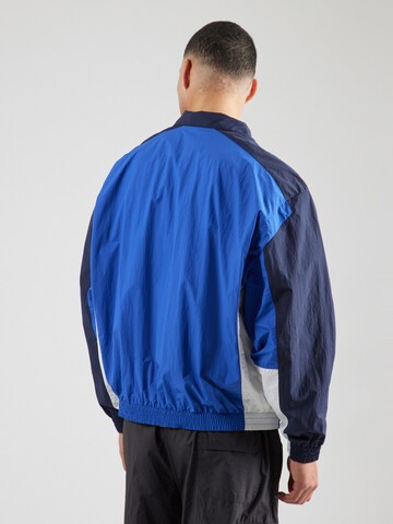 Veste mi-saison 'CLUB' Nike Sportswear en bleu