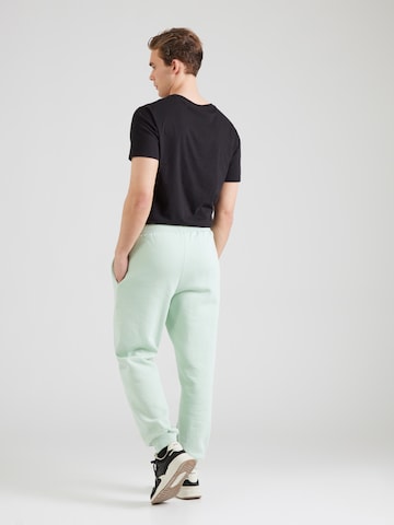 ELLESSE Tapered Hosen 'Cannaregio' in Grün