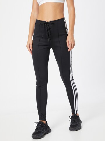 ADIDAS ORIGINALS Skinny Pants in Black: front