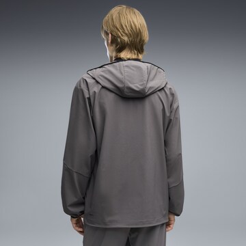 PUMA Winterjacke'TECH ' in Grau