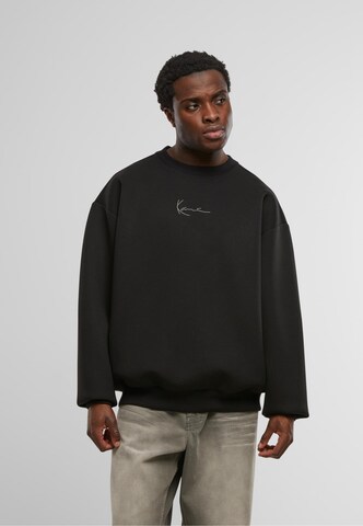 Karl Kani Sweatshirt in Black: front