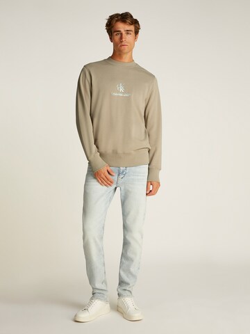 Calvin Klein Jeans Свитшот в Бежевый