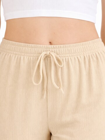 Wide Leg Pantalon 'FLORYN – Palazzohose Crinkle' fashionshowcase en beige