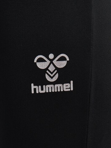Coupe slim Pantalon de sport Hummel en noir
