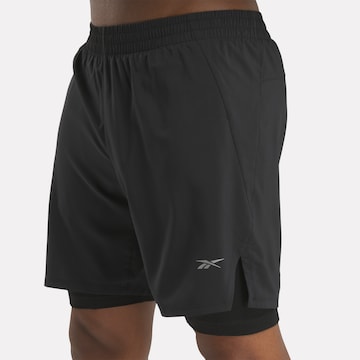 Regular Pantalon de sport Reebok en noir