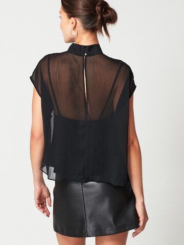 Next - Blusa en negro