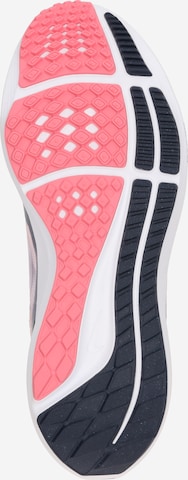 NIKE - Zapatillas de running en rosa