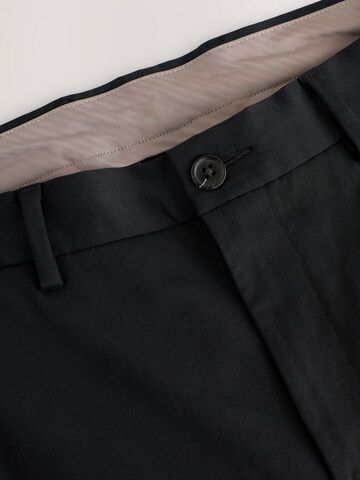 Next Slimfit Hose in Schwarz