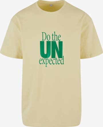 T-Shirt 'Do The Unexpected' MT Upscale en jaune : devant