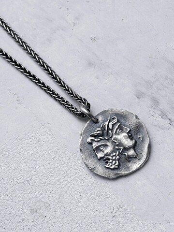 REYTEL - Pingente 'DOUBLE MASK OF THE SAGITTARIUS (ancient greek coin)' em prata: frente
