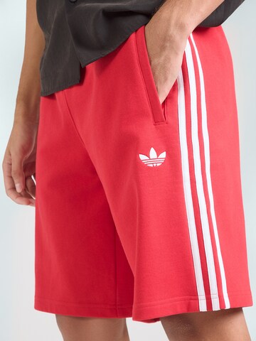ADIDAS ORIGINALSregular Hlače - crvena boja
