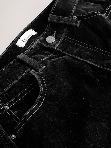 Next - Loosefit Pantalón en negro