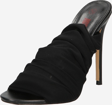 Misspap Mules in Black: front