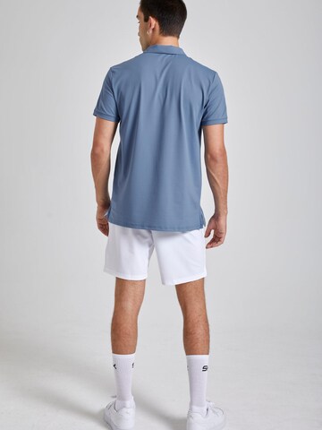 T-Shirt fonctionnel 'Polo' SPORTKIND en bleu