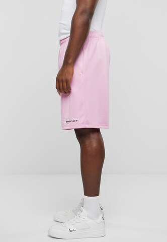 Karl Kani Regular Shorts in Pink