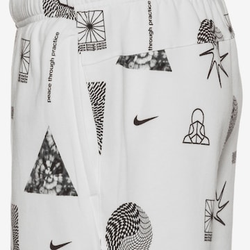 NIKE Sports trousers in White