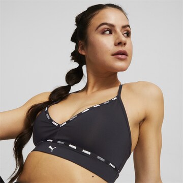 PUMA Bustier Sport-BH in Schwarz