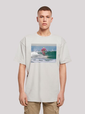 F4NT4STIC Shirt 'Batman TV Series Joker Surfing ' in Grijs: voorkant