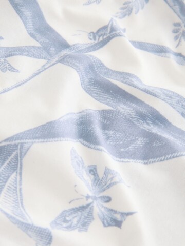 Next Νυχτικιά σε λευκό