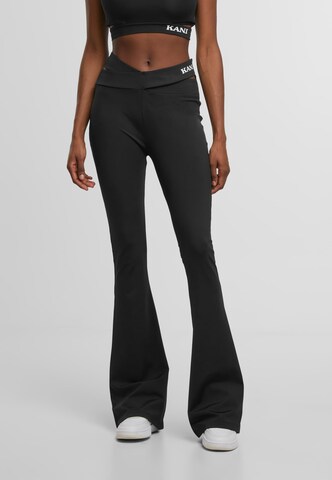 Karl Kani Flared Trousers in Black: front