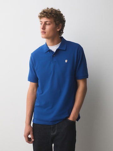 Tricou de la Next pe albastru: față