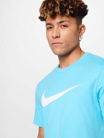 T-Shirt 'Swoosh' Nike Sportswear en bleu