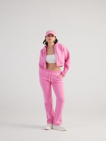 HOLLY LOLLY Regular Trousers in Pink