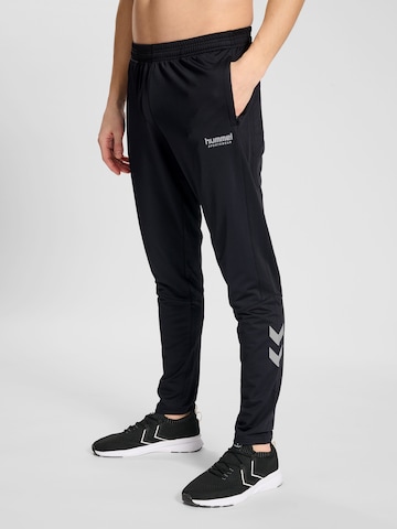 Coupe slim Pantalon de sport Hummel en noir : devant