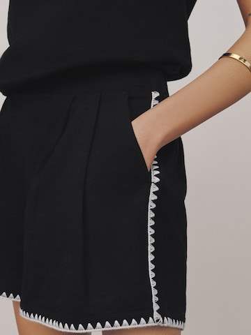 Next Loosefit Shorts in Schwarz