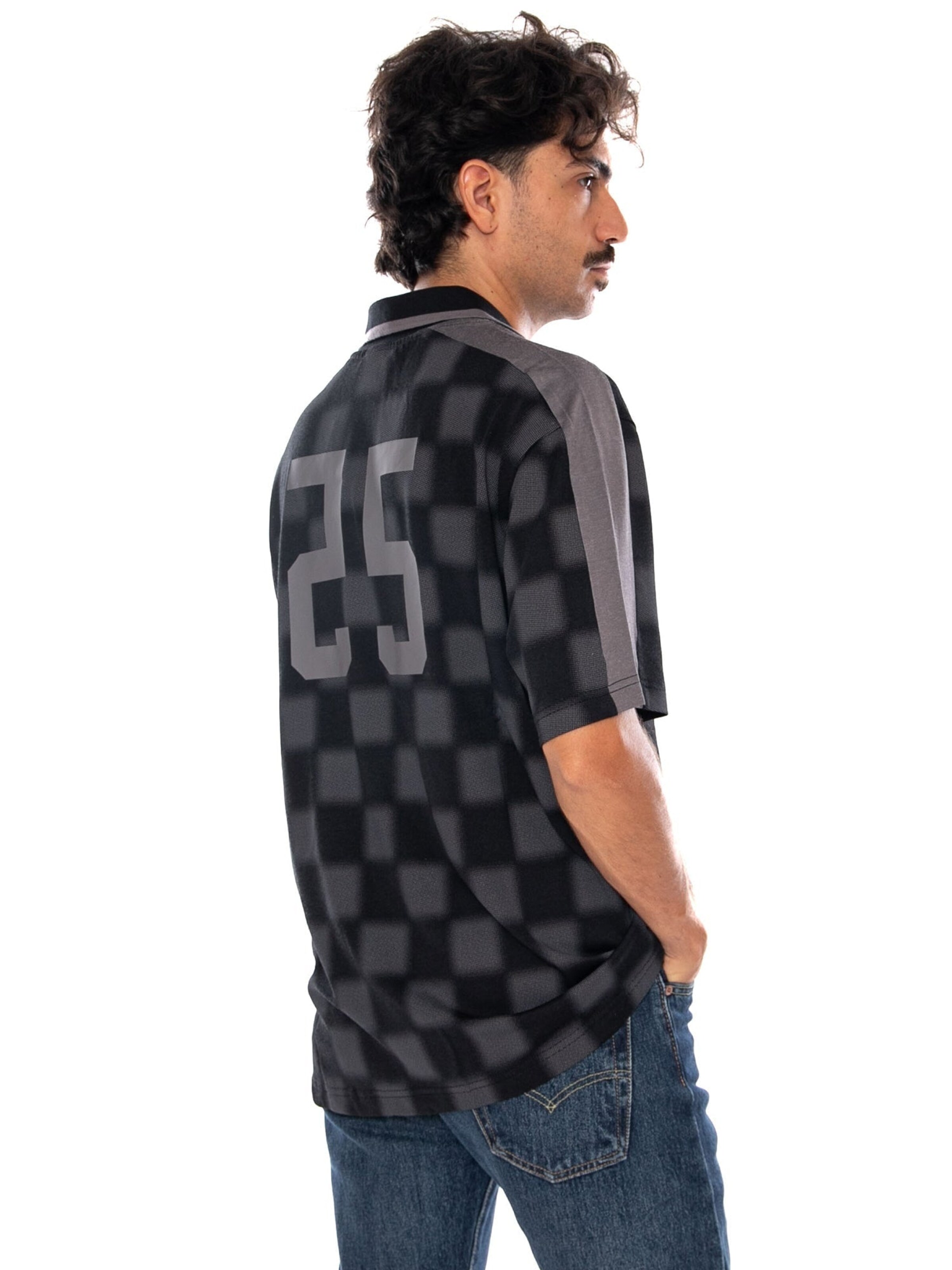Maglietta 'POLO BLACK' di Champion in nero