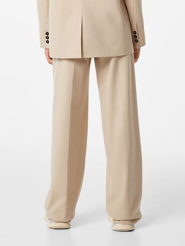 Bershka Loose fit Pleat-Front Pants in Beige