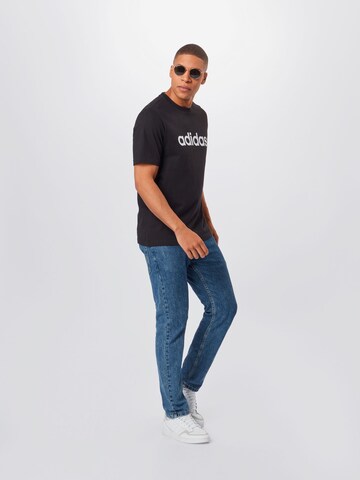 ADIDAS SPORTSWEAR - Camisa funcionais em preto