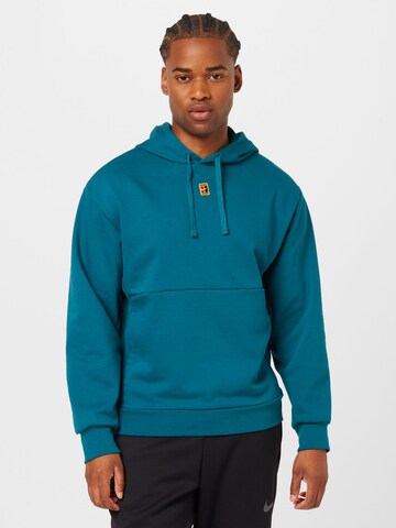 Sweat de sport NIKE en bleu : devant