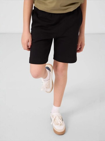 Tommy Life tavaline Püksid 'TOMMY Jugend-Shorts Mit Normaler Passform Mittlerer Taille', värv must