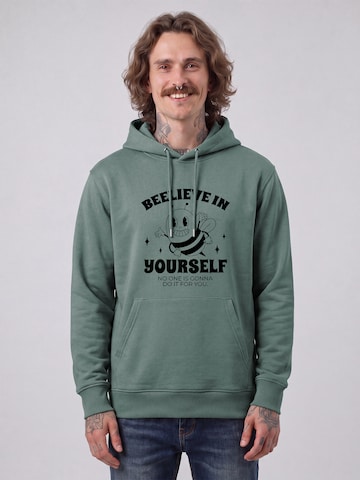 Felpa 'Beelieve in yourself' di Watapparel in verde: frontale