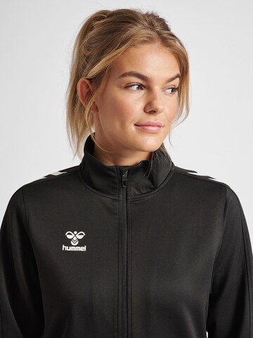 Veste de survêtement 'CORE XK' Hummel en noir