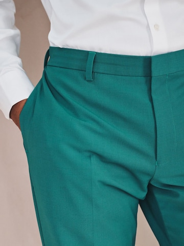 Next Slimfit Hose 'Motion Flex' in Blau