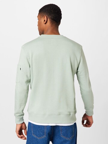 ALPHA INDUSTRIES Sweatshirt in Grün