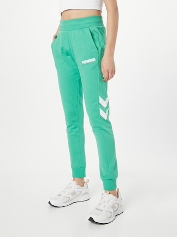 Hummel - Tapered Pantalón deportivo en verde: frente