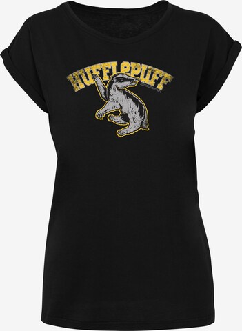 Maglietta 'Harry Potter Hufflepuff Sport Emblem' di F4NT4STIC in nero: frontale