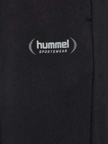 Effilé Pantalon 'FELIX' Hummel en noir