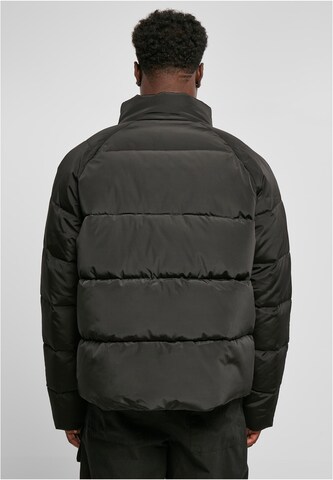 Urban Classics Winter jacket 'Raglan' in Black