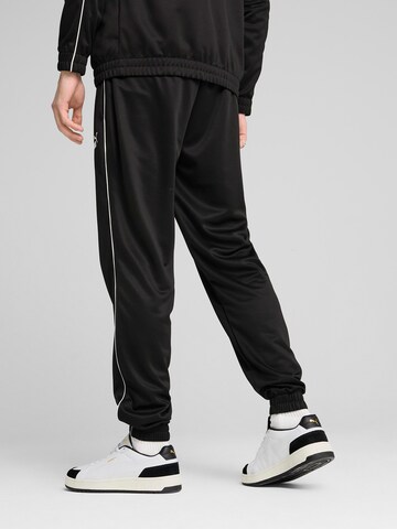 PUMA Tapered Sports trousers in Black