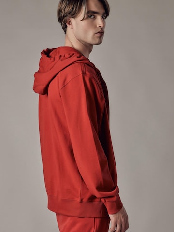 Sweat-shirt 'Felpa con Cappuccio e Zip' OWN Off With Nature en rouge