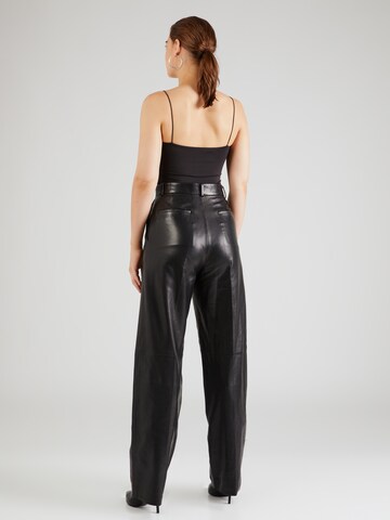 IRO Loose fit Trousers with creases 'EVELI' in Black