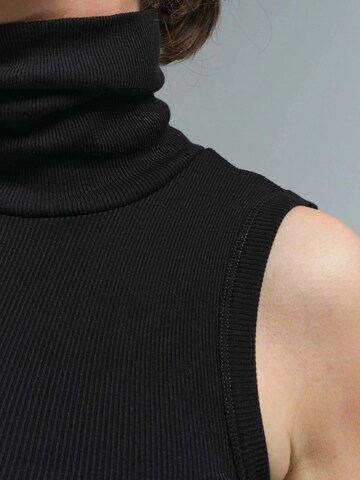 Haut 'Fleur' Seamless Basic en noir